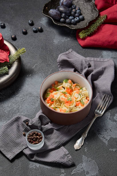 Classic Dumplings with Meat, Garnished with Tomato Tartar and Dill, Artistic Winter Menu Composition
