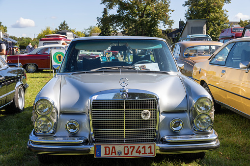 Weiterstadt, Germany September 24, 2023: Mercedes SL in silver with chrome flashes in Weiterstadt at Braunshardt Castle