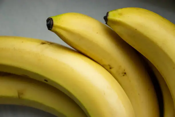 Close-up of ripe bananas highlighting rich source of vitamins.