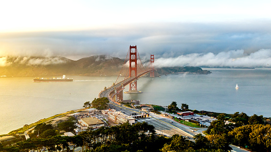 Golden Gate Bridge engulfed by fog and clouds, San Francisco