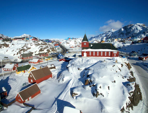 Sisimiut from above with the landmark Sisimiut Church, Greenland, Denmark. Image was taken with a drone.