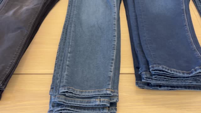 Jeans on outlet store 4k stock video