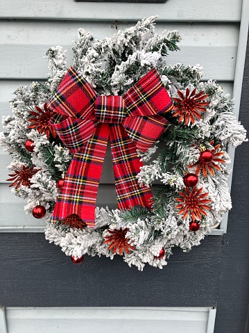 Christmas wreath with red bow, snow wreath, winter wreath