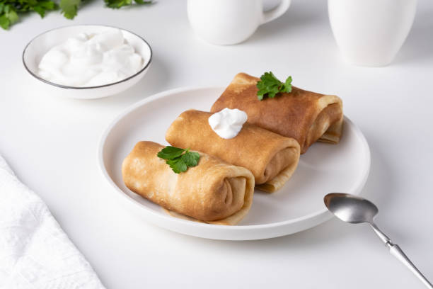 istock Stuffed pancakes crepes with meat 1958212722