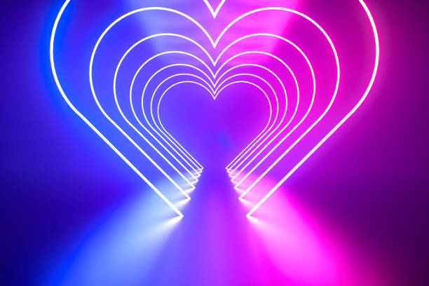istock Valentines Day Heart Shape with ultraviolet neon lights 1958221574