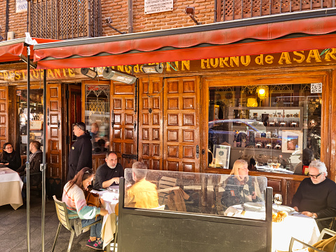 Madrid, Spain - 05 February, 2023: People eating at Maison Botin restaurant. Founded in 1725, it is the oldest restaurant in the world according to the Guinness Book of Records.