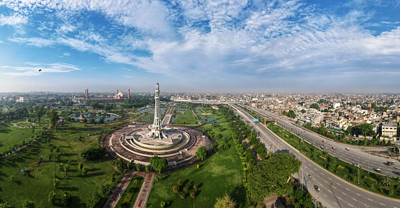 A 180-degree aerial panorama of Minar-e-Pakistan (Pakistan Monument) after rain and in clear weather.