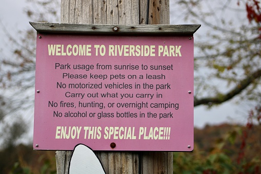 Roscoe, NY, USA, 10.10.22 - A sign at Riverside Park that lists the rules of the park.