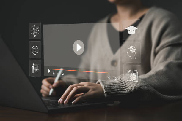 istock e learning concept. Woman learning online with webinar. The Internet is used for modern education. seminar meeting, elearning technology, video tutorial, online lessons, digital training study course, 1958333838