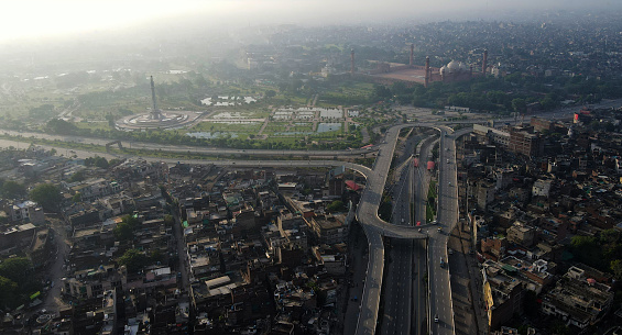An early morning aerial image of Aazadi Chowk, including the newly built interchange. Historical Lahore Fort (built by Mughals) can be seen in the background.