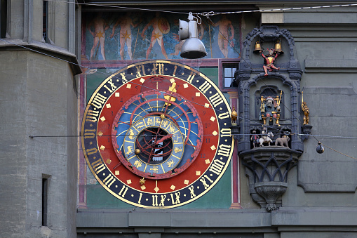 Bern, Switzerland - December 22, 2015: The dial of the astronomical clock of the Zytglogge was restored in 1983 and is located on the eastern front of the Clock Tower (1191-1256).