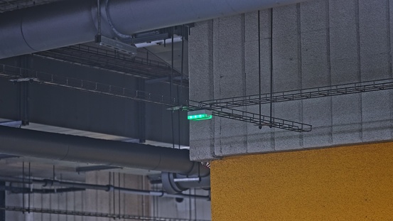 Parking Lot Automated Parking Spot Occupation Ceiling Sensor Indicator with Blinking Pulsing Green LEDs