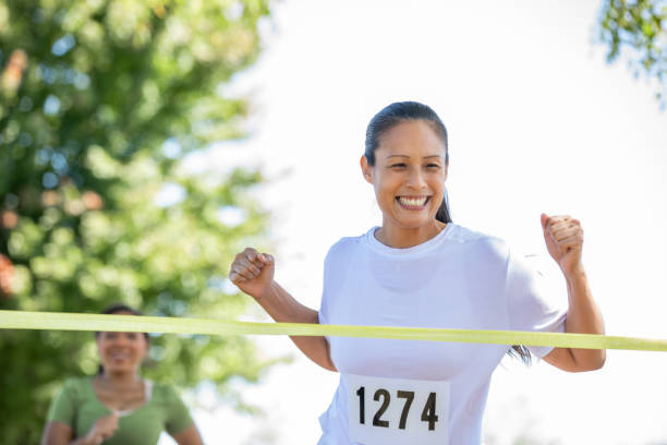 istock People from different walks of life join forces to run a 5k race, supporting a charitable organization. 1958459216