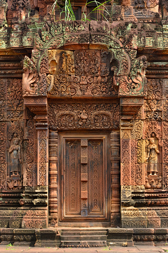Detail of the carvings in one of the doors in Banteay Srei. Angkor, Cambodia