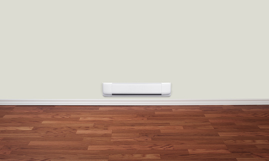 White wall-mounted electric baseboard convection heater