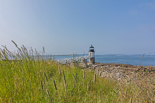 Marshall Point Lighthouse in Port Clyde Maine USA on a sunny summer day