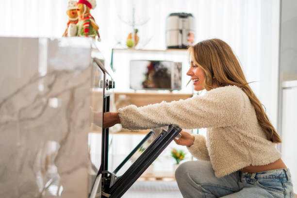 Woman is cooking at home
