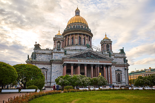 Saint Petersburg, Russia - June 03, 2023: St. Isaac's Cathedral is the largest cathedrals in the world on a sunny day, St. Petersburg, Russia, cloudy sunny evening sky background