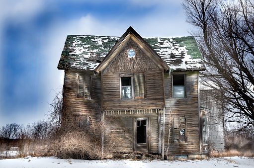 Burned out and abandoned house in Detroit, MI.  See other examples by clicking on the link below.