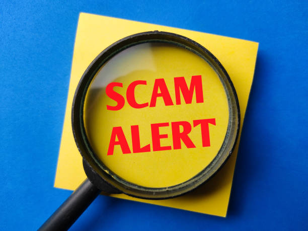 istock Magnifying glass with the word SCAM ALERT 1958678570