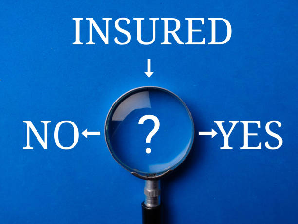 istock Magnifying glass with the word INSURED NO YES 1958688184