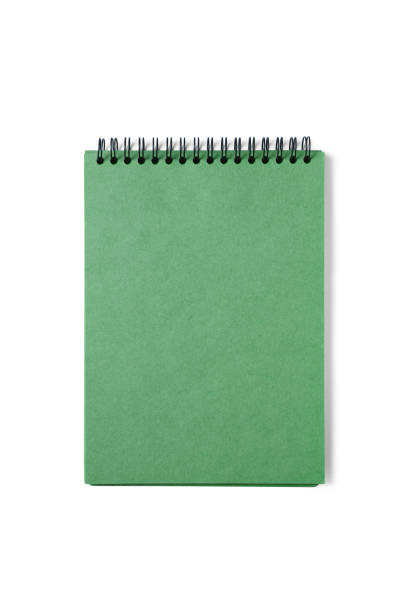 istock Open spiral bound notepad with craft green sheets, isolated on white background. 1958720608