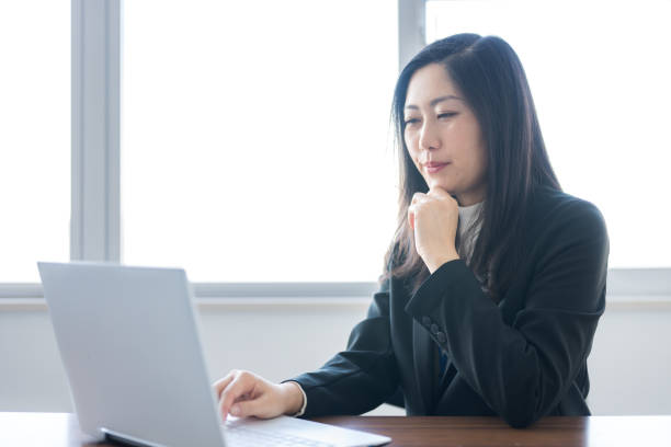 istock thinking business woman 1958738622
