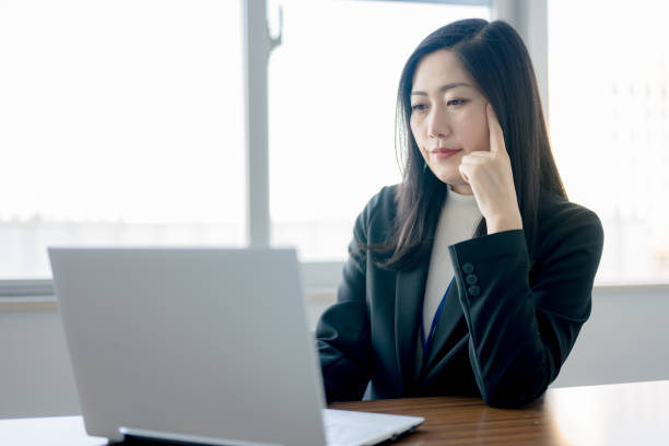 istock thinking business woman 1958739141