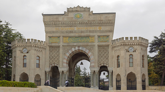 Istanbul, Turkey - October 18, 2023: Istanbul University Historical Beyazit Gate at Cloudy Fall Day.