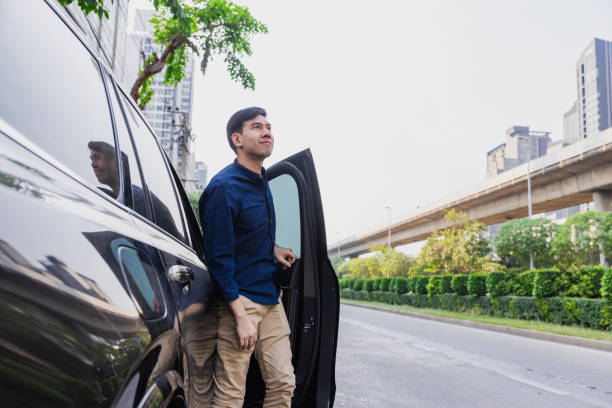 istock People enjoy their car in city. 1958802511