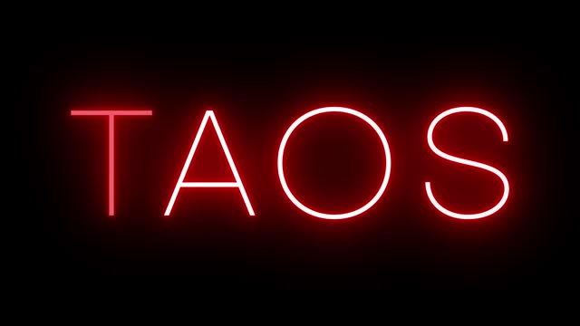 Glowing and blinking red retro neon sign for TAOS