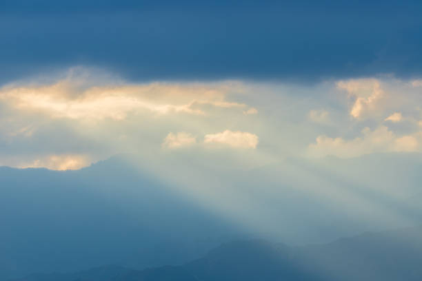 it is Sunrise rays from the mountaintop