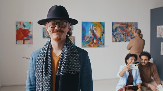 Portrait of Eccentric Young Man at Contemporary Art Exhibition