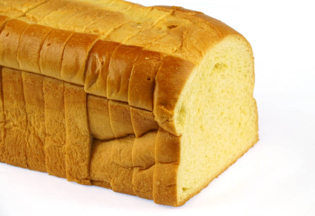 istock close up on sliced french bread isolated on white background 1959032002