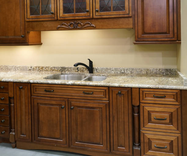 istock close up on modern kitchen counter top with cabinet and sink 1959037204