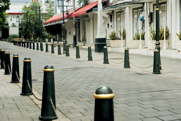 istock Row of iron bars in pedestrian zone. 1959050579