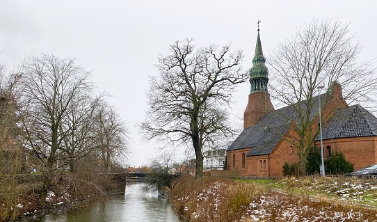 This church is relatively new, as it was built in 1911. It is centrally situated in centre of Frederiksværk on the old marketplace. Frederiksværk, located in Zealand, Denmark, is a town with a population of 12,815 individuals. The photograph was captured on January 21, 2024, in Frederiksværk, Denmark.