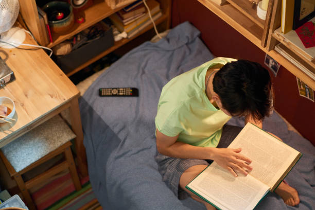 istock Chinese student revising homework 1959151179