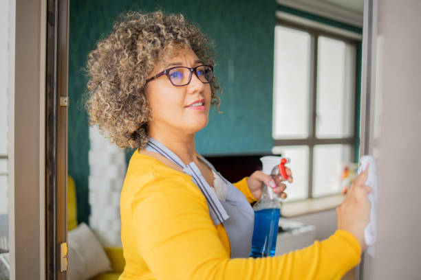 istock Woman washing window 1959155613