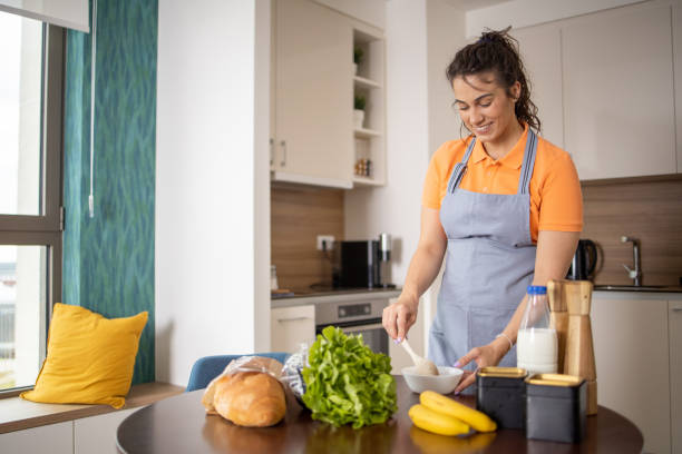 istock Young woman is preparing a meal 1959181311