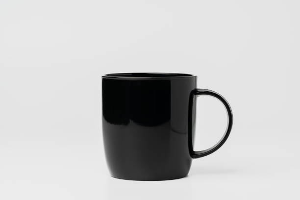 istock Black coffee mug mock up on white background copy space 1959221840