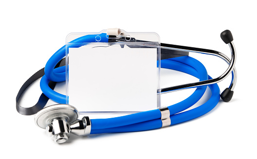 Blank badge and stethoscope on white background copy space