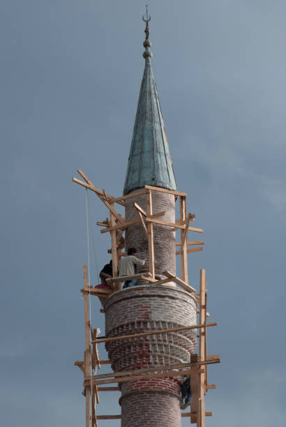 istock People repairing the minaret 1959293283