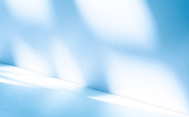 istock Wall interior background, studio, and backdrops show products. with shadow from window color white and blue light. background for text insertion and presentation of product 1959294930