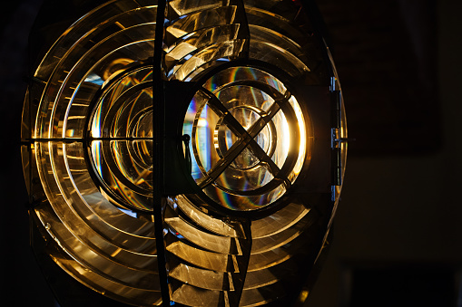 Close up photo of lighthouse lamp with a Fresnel lens. It is a type of composite compact lens developed by the French physicist Augustin-Jean Fresnel