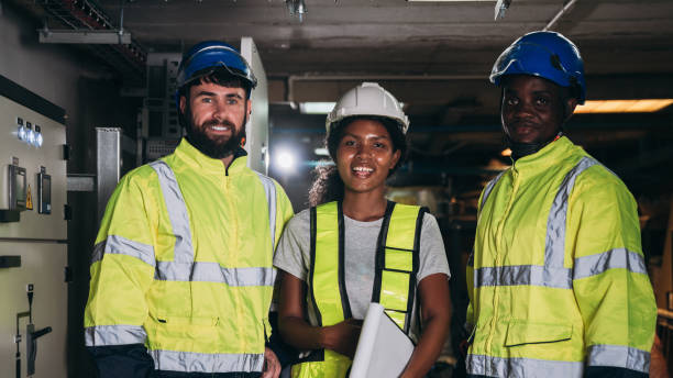 istock Team Engineers inspected the electrical switchboard and verified the operational voltage range. Technician setting electrical in inverter solar panel room 1959325091