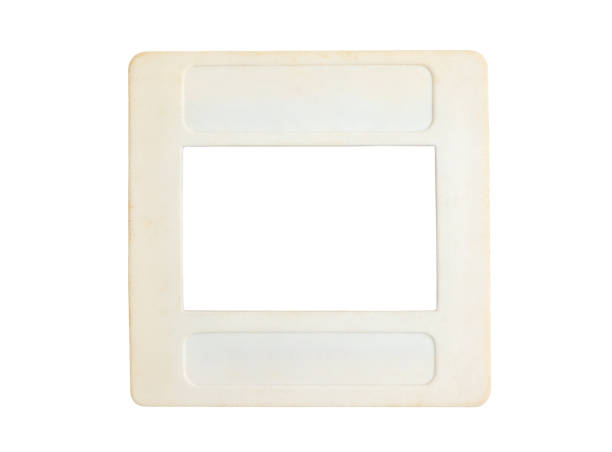 Negative slide film frame, 35mm slide film isolated on white background with clipping path. Old plastic slide film mount frame