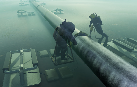 Divers at work on the underwater pipeline