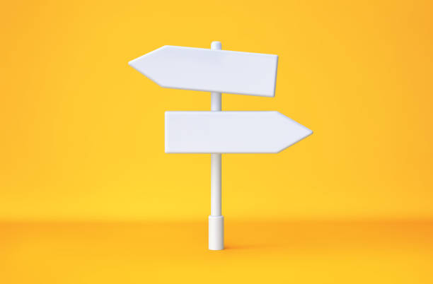 istock Left and right direction sign on yellow background. Clipping path included 1959353888