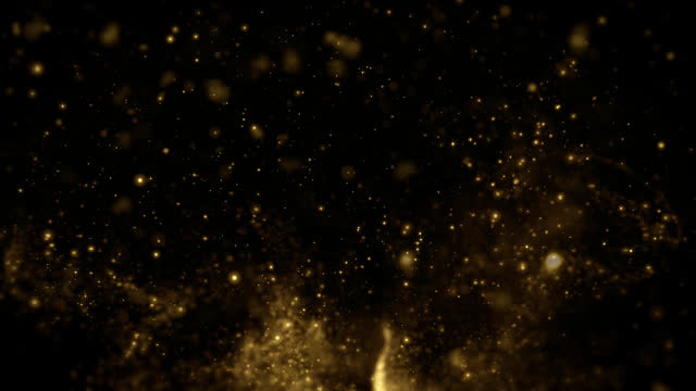 Gold dust particles glitter dust Animation Explode Sparkle fast energy flying wave on black background